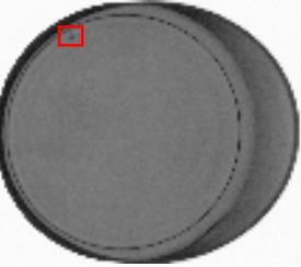 X-ray image of a canned product with a highlighted dent region