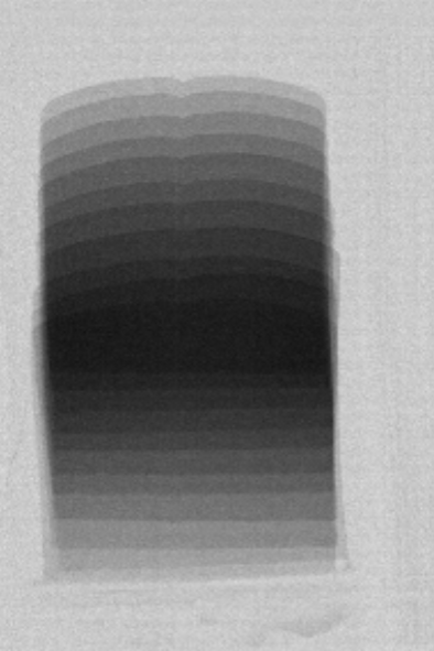 Packaged-food X-ray showing normal seal-region and fill variation.